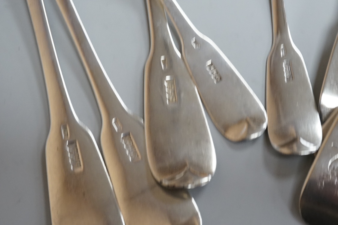 A set of six late George III Irish silver fiddle pattern table spoons and six matching dessert spoons, Philip Weekes, Dublin, 1818, 20.6oz.